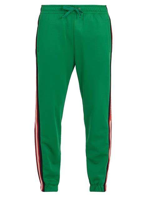 gucci green stripe track pantsmen|gucci jogging pants.